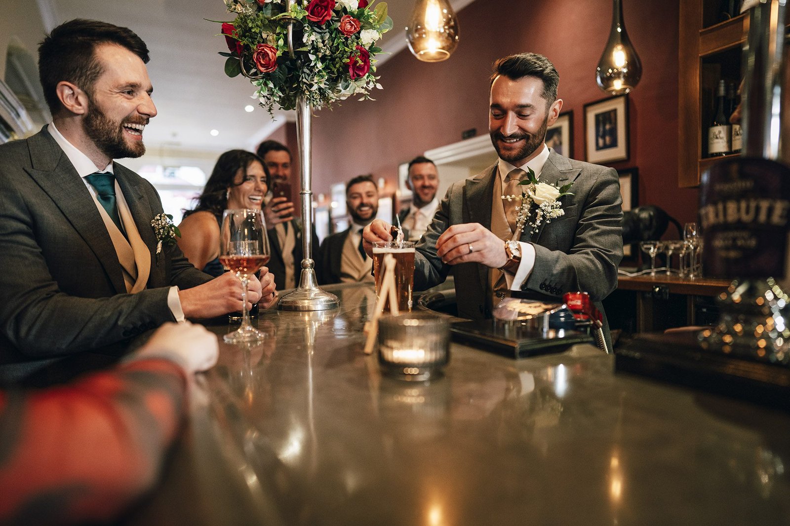 groomsmen at the bar at St Elizabeth' house